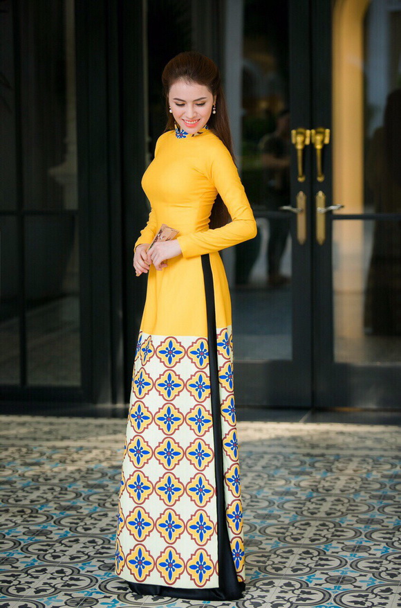 Hoa Hậu Thư Dung dịu dàng đón xuân với áo dài truyền thống - Báo Gia Lai điện tử